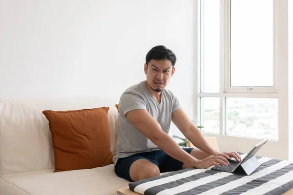 Angry Furious Asian Trader Man Working Tablet Laptop His Apartment — 스톡 사진