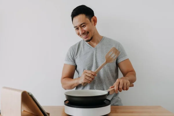 Happy Asian Man Cooking Online Tutorial Tablet Isolated White Background — Stok Foto