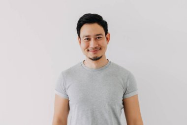 Warm smile face of kind asian man isolated white background. Happiness concept.