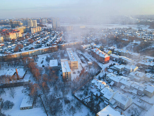 Aerial view of the city on a frosty day after a snowfall