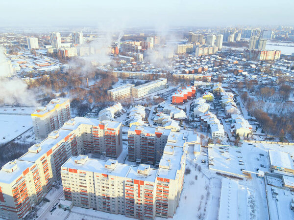 Aerial view of the city on a frosty day after a snowfall