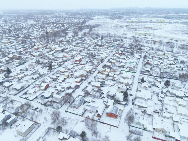 Aerial view of the city on a cloudy winter day