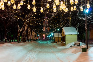 Christmas street lights night over the city