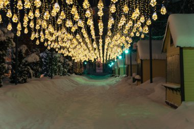 Christmas street lights night over the city