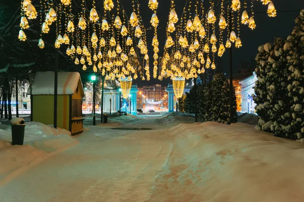Christmas street lights night over the city