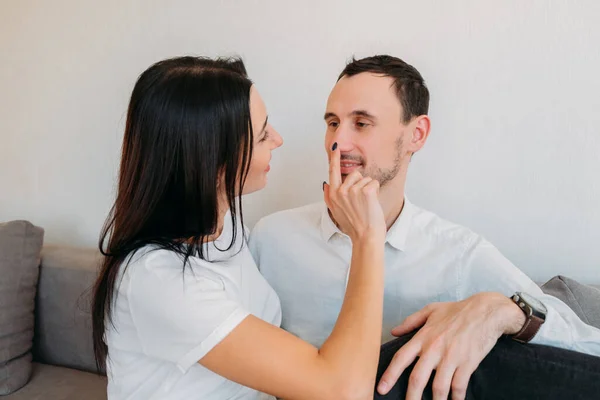 Girl Jokes Guy Touching His Nose While Sitting His Lap — Stock Photo, Image