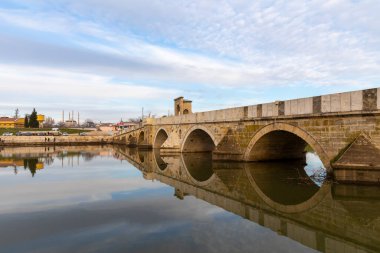 EDIRNE, TURKEY, DECEMBER 22, 2021:Tunca bridge over Tunca river and Selimiye Mosque inEdirne