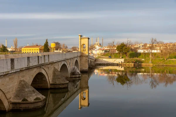 EDIRNE, TURKEY, DECEMBER 22, 2021:Tunca bridge over Tunca river and Selimiye Mosque inEdirne