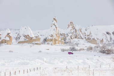 Pigeon Valley and Cave town in Goreme during winter time. Cappadocia, Turkey. 