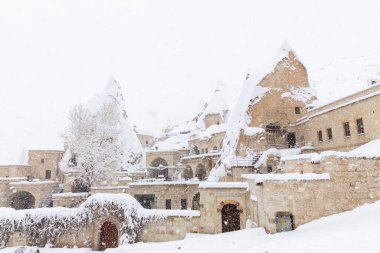 Pigeon Valley and Cave town in Goreme during winter time. Cappadocia, Turkey. 