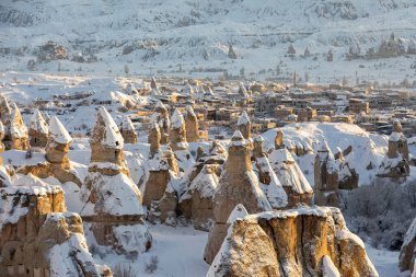 Pigeon Valley and Cave town in Goreme during winter time. Cappadocia, Turkey. 