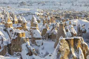 Pigeon Valley and Cave town in Goreme during winter time. Cappadocia, Turkey. 