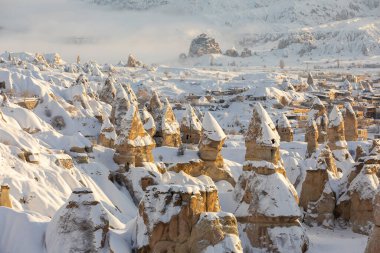 Pigeon Valley and Cave town in Goreme during winter time. Cappadocia, Turkey. 