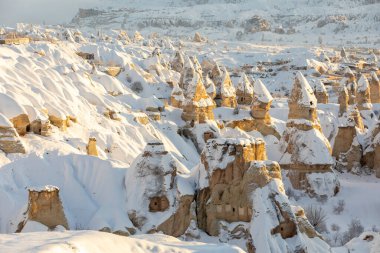 Pigeon Valley and Cave town in Goreme during winter time. Cappadocia, Turkey. 