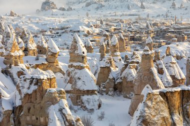 Pigeon Valley and Cave town in Goreme during winter time. Cappadocia, Turkey. 