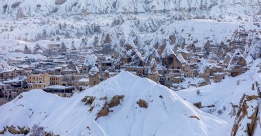Pigeon Valley and Cave town in Goreme during winter time. Cappadocia, Turkey. 