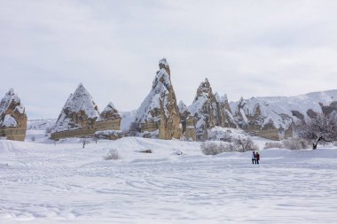 Pigeon Valley and Cave town in Goreme during winter time. Cappadocia, Turkey. 