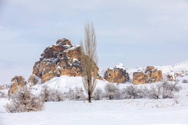 Pigeon Valley and Cave town in Goreme during winter time. Cappadocia, Turkey. 