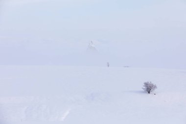 Pigeon Valley and Cave town in Goreme during winter time. Cappadocia, Turkey. 