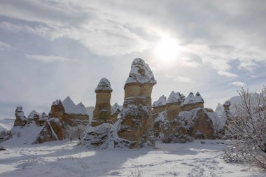 Pigeon Valley and Cave town in Goreme during winter time. Cappadocia, Turkey. 
