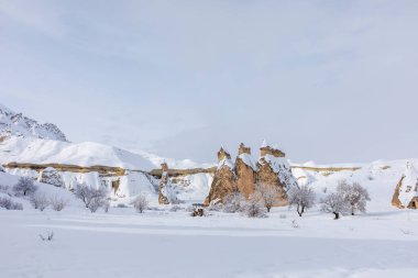 Pigeon Valley and Cave town in Goreme during winter time. Cappadocia, Turkey. 