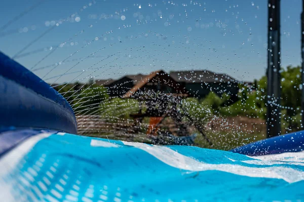 Selective Focus Jets Droplets Shooting Out Water Slide High Quality — Stockfoto