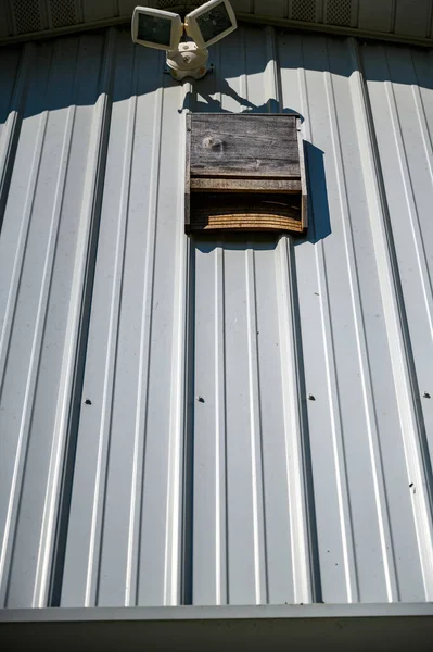 Wooden Bat House White Corrugated Tin Barn High Quality Photo — Photo