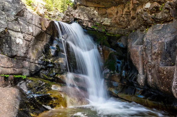 Aster Falls accessible from the South Shore Trailhead at Two Medicine Lake in Glacier National Park, Montana. High quality photo