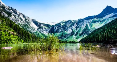 Shoreline view from Avalanche Lake in Glacier National Park, MT.A. High quality photo