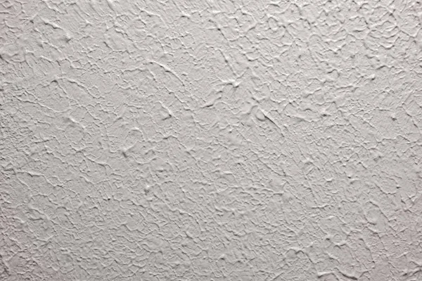 Stomp brush style drywall texture from the 1980s. High quality photo