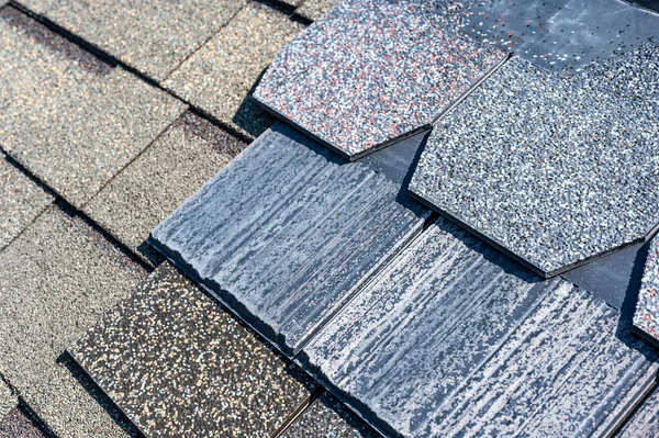Assorted selection of synthetic roof shingles to pick a new style. High quality photo