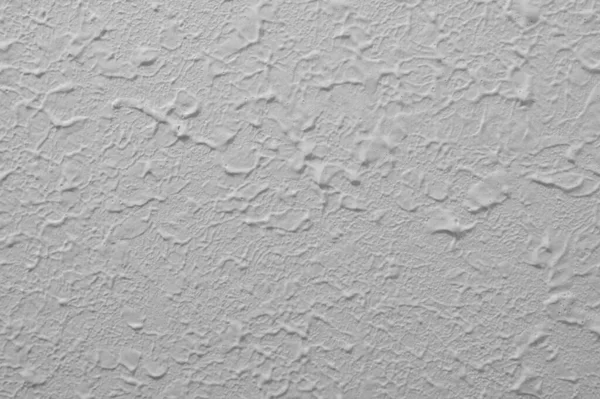 Stomp brush style drywall texture from the 1980s. High quality photo