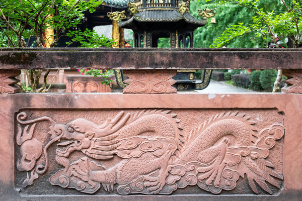 Bas-relief of a dragon on a wall in QingYangGong taoist temple, Chengdu, Sichuan province, China