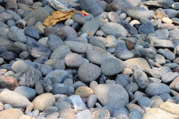 工業的背景のための積層ビーチ石と小石のテクスチャ — ストック写真