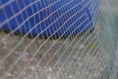 Endüstriyel arkaplan için tel örgüsünün odaklanmamış soyut arkaplanı