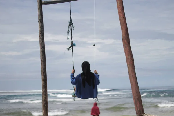 Young Asian Woman Black Hijab Blue Shirt Sitting Swing Cibuaya — Stock Photo, Image