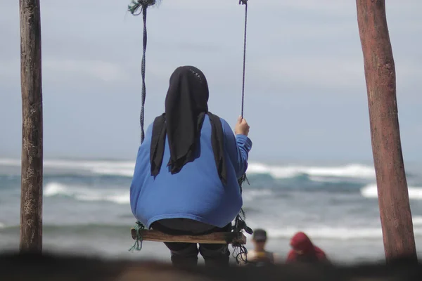 Young Asian Woman Black Hijab Blue Shirt Sitting Swing Cibuaya — Stock Photo, Image