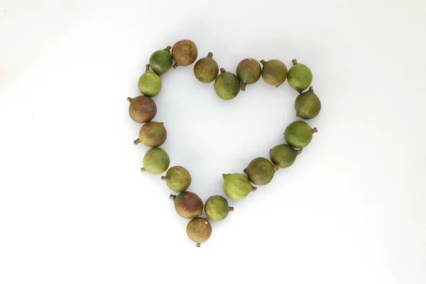 Group Macadamia Nuts Heart Shaped Copy Space Isolated White Background — Stock Photo, Image