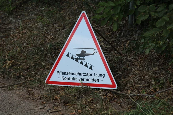 warning sign in German vineyard with german text saying \