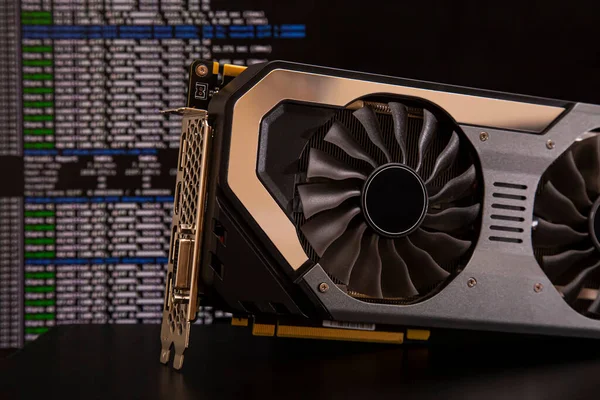 Close-up video card with command line running on background showing cryptocurrency mining — Stok fotoğraf