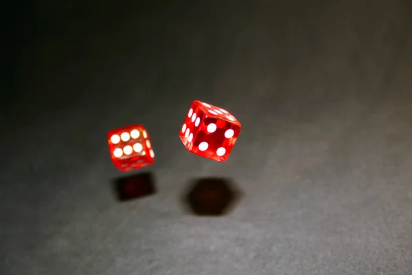 Red Dice Motion Black Background — Stock Photo, Image