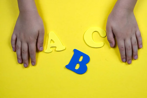 Childrens Hands Yellow Background Letters Alphabet Child Integration Language Learning —  Fotos de Stock