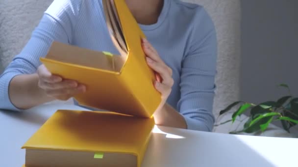 Girls Hands Holding Yellow Book Education Concept High Quality Photo — Vídeo de Stock