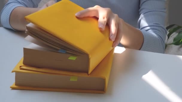 Girls Hands Holding Yellow Book Education Concept High Quality Photo — Videoclip de stoc