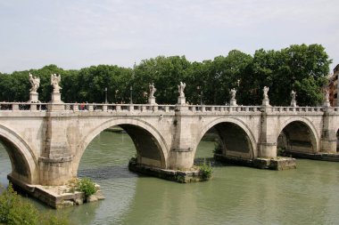 Another river with a bridge crossing the river in Rome.