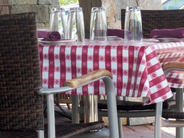 The table is set at the restaurant and it has a comfortable feeling.