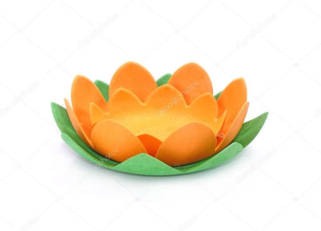 Krathong in lotus flower-shape for Loy Krathong festival. Biodegradable Krathong made from tapioca starch. Krathong isolated on white background