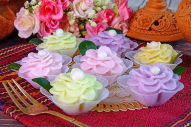 Chor Keaw, Auspicious Thai dessert for wedding ceremony party and all Thai festival. Flower-shaped Thai sweetmeat, selective focus clipart