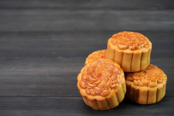 Mooncake for Mid Autumn Festival. Traditional Chinese pastry Moon cake for Chinese Moon festival. Selective focus, copy space