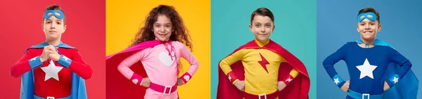 Magabiztos gyerekek szuperhős jelmezben — Stock Fotó
